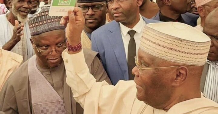 Ex-Vice President Atiku Abubakar displays his African Democratic Congress (ADC) membership card, November 24, 2025