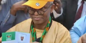Malam Nasir El-Rufai displays his African Democratic Congress (ADC) membership card