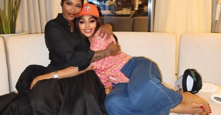 Tiwa Savage and Regina Daniel in London