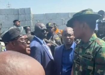 Naval officer, A.M. Yerima, in a direct confrontation with FCT Minister, Nyesom Wike.