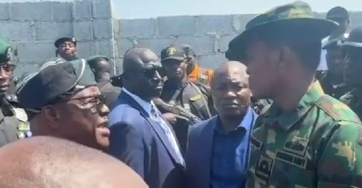 Naval officer, A.M. Yerima, in a direct confrontation with FCT Minister, Nyesom Wike.