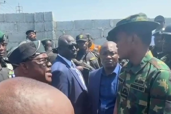 Naval officer, A.M. Yerima, in a direct confrontation with FCT Minister, Nyesom Wike.