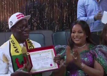 Anambra State Governor, Prof. Chukwuma Charles Soludo, shows off the the Certificate of Return