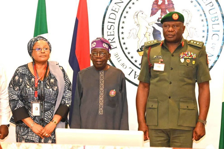 Chief of Defence Staff (CDS), General Olufemi Olatubosun Oluyede, decorates President Bola Ahmed Tinubu with the emblem for the 2026 Armed Forces Remembrance Day in State House, Abuja, Tuesday, December 2, 2025.
