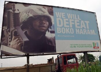 "We will defeat Boko Haram" signpost in Borno State