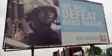 "We will defeat Boko Haram" signpost in Borno State