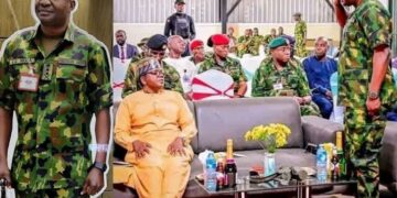 General Christopher Gwabin Musa saluting his former boss, the Minister of State for Defence, Bello Matawalle