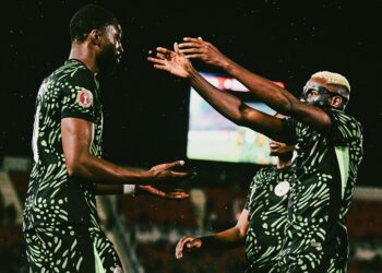 Victor Osimhen hugs Semi Ajayi after the powerful header that fetched the opening goal against Tanzania