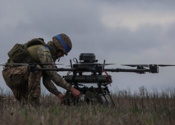 Ukrainian soldier setting of a drone for attack