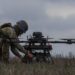 Ukrainian soldier setting of a drone for attack