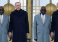 Turkish President Recep Tayyip Erdogan holding President Bola Ahmed Tinubu’s hand during official proceedings