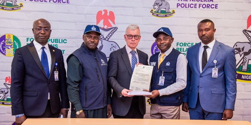 Hand over of the sum of $23,000 to the Royal Cayman Islands Police Service through the British High Commission in Abuja