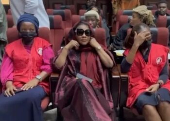 EFCC officials with Aisha Achimugu in Nigerian courtroom