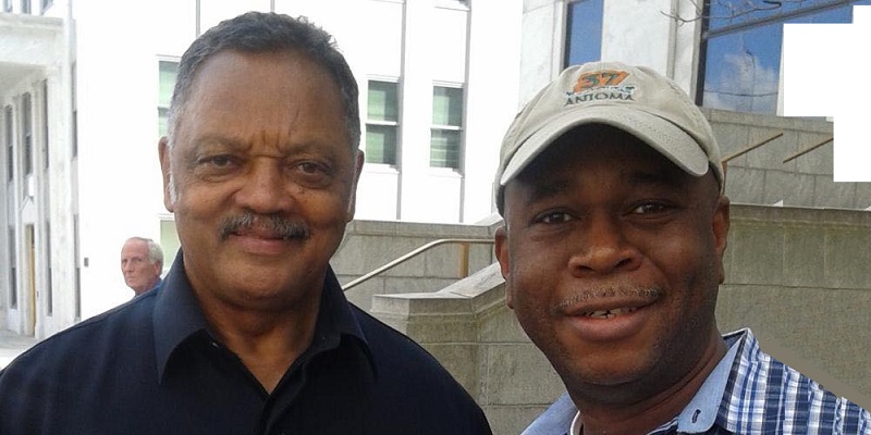 Emmanuel Ohai with late civil rights icon, Rev. Jesse Jackson