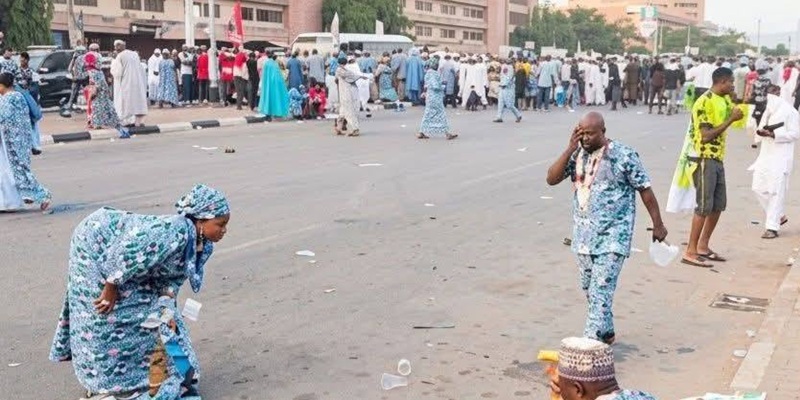 Delegates scamper for safety after Police fired tear gas at APC convention in Abuja