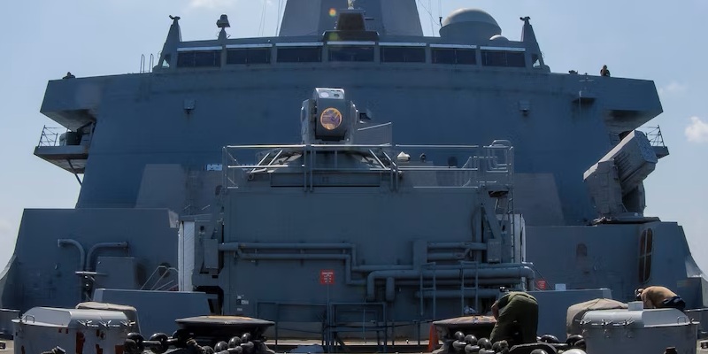 Amphibious transport dock USS Portland (LPD 27) transits the Gulf of Aden, Dec. 13, with a Solid State Laser – Technology Maturation Laser Weapons System Demonstrator Mark 2 MOD 0 on board