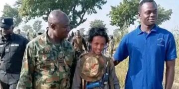 VIRAL: Soldiers Seen in Photo Ops with Boy-Bandit