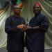 Peter Obi presenting award of excellence to Obunike Ohaegbu