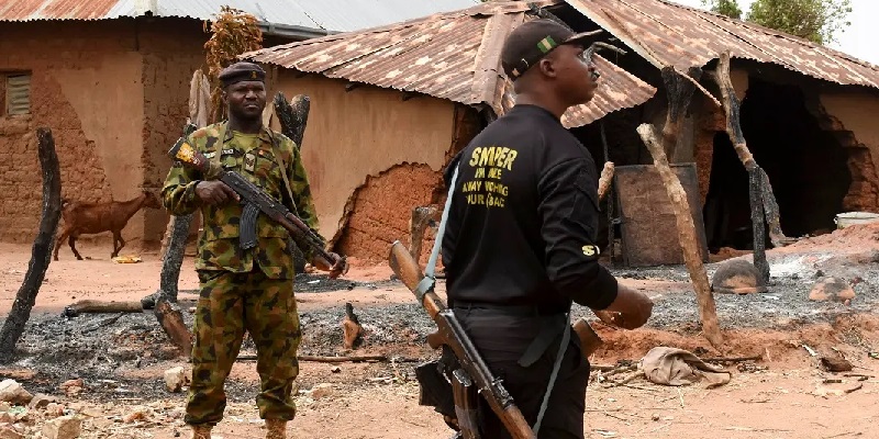 Security operatives inspect scene of a violent attack in Plateau State