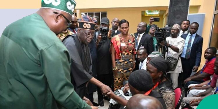 President Bola Ahmed Tinubu and Plateau State Governor Caleb Mutfwang with victims of the recent Plateau attacks at the Jos airport