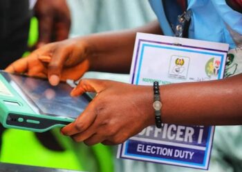 Independent National Electoral Commission (INEC) ad-hoc staff uploading data to the INEC Result Viewing (IREV) portal