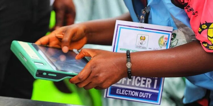 Independent National Electoral Commission (INEC) ad-hoc staff uploading data to the INEC Result Viewing (IREV) portal
