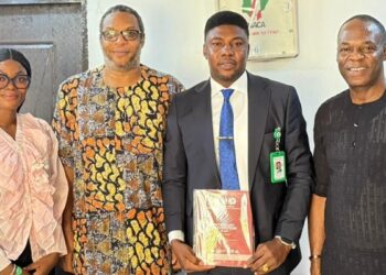 Dr. Nkem Okeke with senior officials of the National Agency for the Control of AIDS (NACA)