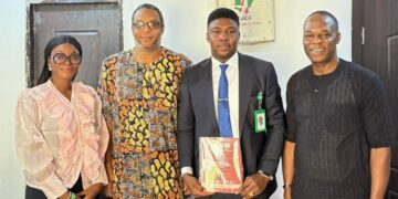 Dr. Nkem Okeke with senior officials of the National Agency for the Control of AIDS (NACA)