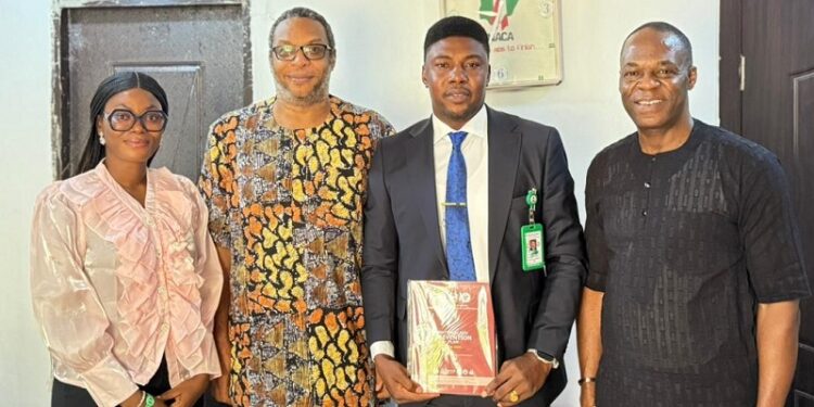 Dr. Nkem Okeke with senior officials of the National Agency for the Control of AIDS (NACA)