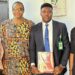 Dr. Nkem Okeke with senior officials of the National Agency for the Control of AIDS (NACA)