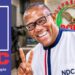 Peter Obi displays NDC victory sign with POEM logo at the background