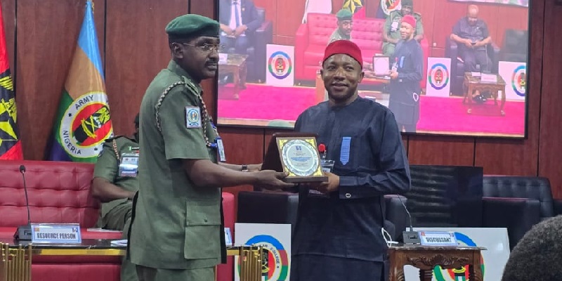 Dr. Chike Walter Duru presented a plaque by the Directorate of Army Public Relations (DAPR) at Army War College Nigeria, Asokoro, Abuja