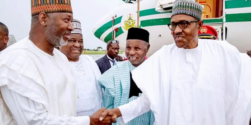 Partners in crime? Former President Muhammadu Buhari in handshake with then Minister of Aviation, Hadi Sirika, following the fraudulent "Nigeria Air"