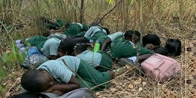 School children sleeping in the open bush