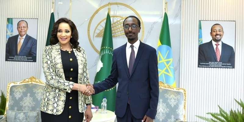 Minister of Foreign Affairs, Bianca Odumegwu‑Ojukwu, Ethiopia’s Minister of Foreign Affairs, Gedion Timothewos, shake hands after signing the Transfer of Sentenced Persons Agreement