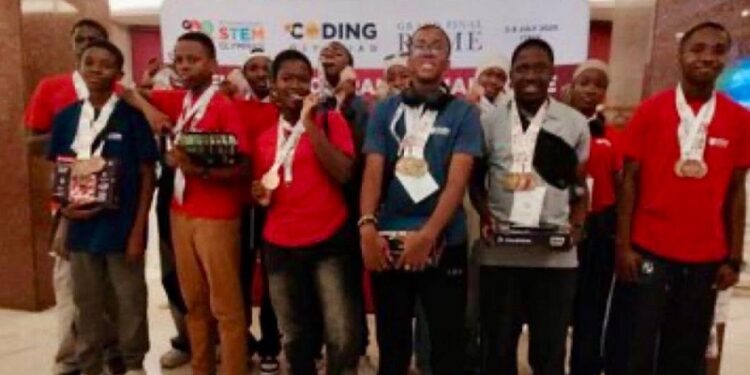 Students of Gonzaga Jesuit College, Okija, Anambra State, celebrate eight gold medals at the recently held Global STEM Olympiad in Rome, Italy