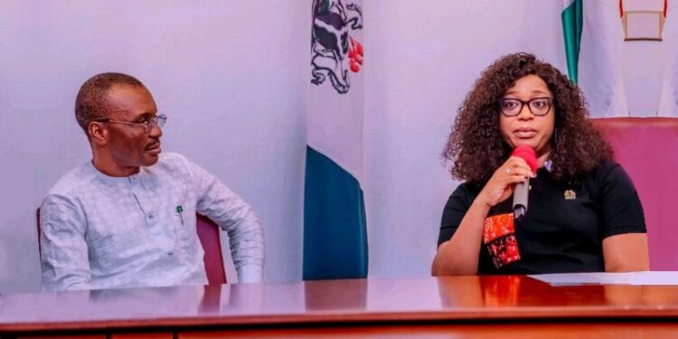 First Lady of Akwa Ibom State, Lady Helen Eno Obareki (right) addressing the delegation as AbasiAndikan listens with rapt attention