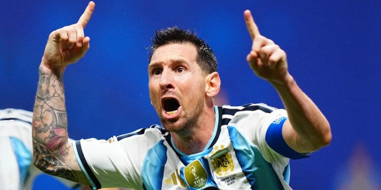 Lionel Messi of Argentina celebrates as his team sends Egypt packing from World Cup