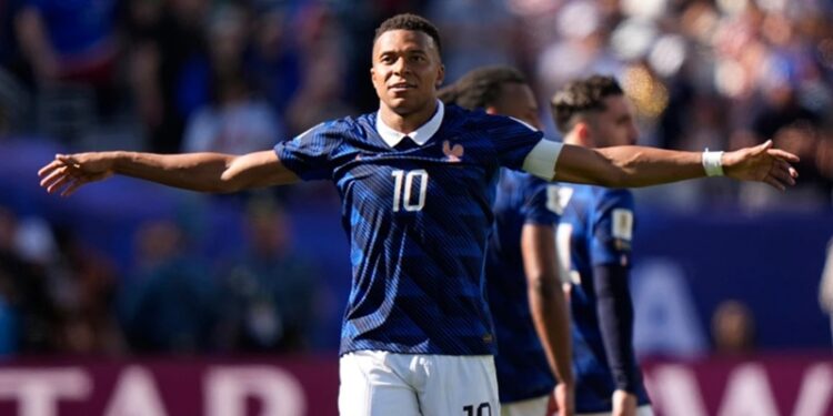 Kylian Mbappé of France celebrates a goal