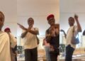 Anambra State Governor Chukwuma Charles Soludo with wife, Nonye Soludo, and son, Ozonna, practicing the latter's dance steps