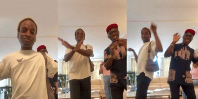 Anambra State Governor Chukwuma Charles Soludo with wife, Nonye Soludo, and son, Ozonna, practicing the latter's dance steps