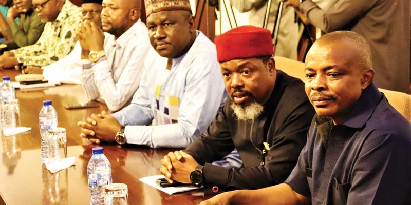 Comrade Emmanuel Ugboaja (second right),&nbsp;NLC President, Joe Ajaero (right), other Labour leaders, during a press conference
