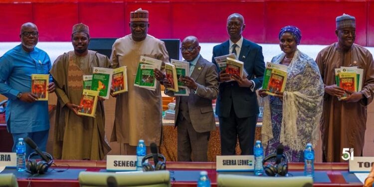 Nigerian Defence Minister Gen. Christopher Musa (3rd from left) with other dignitaries at the unveiling of 4 ECOWAS Publications on Conflict Management