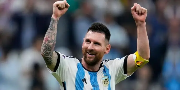 Lionel Messi hails fans after a match