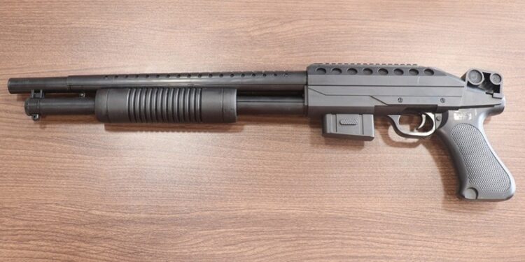 Pump action rifle