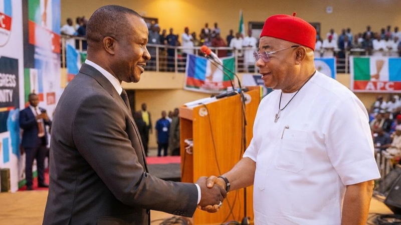 Dr. Ugorji Okechukwu Ugorji and Governor Hope Uzodimma of Imo State in a handshake